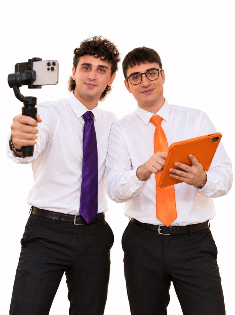 Matteo, filming with a phone, and Pio, the founders of Directlyy